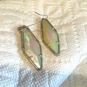 Kendra Scott iridescent earrings in “silver”